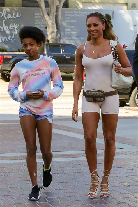 Melanie Brown Wears A Bodysuit As She Arrives With Her