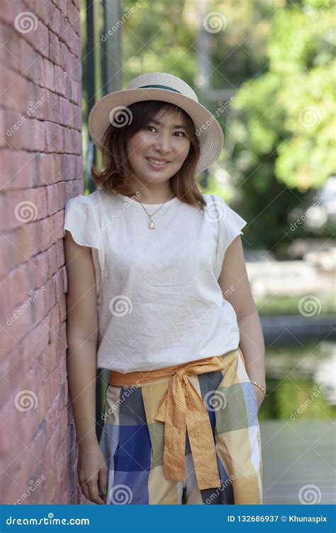 Portrait Of Beautiful Single 40s Years Old Asian Woman Relaxing Stock