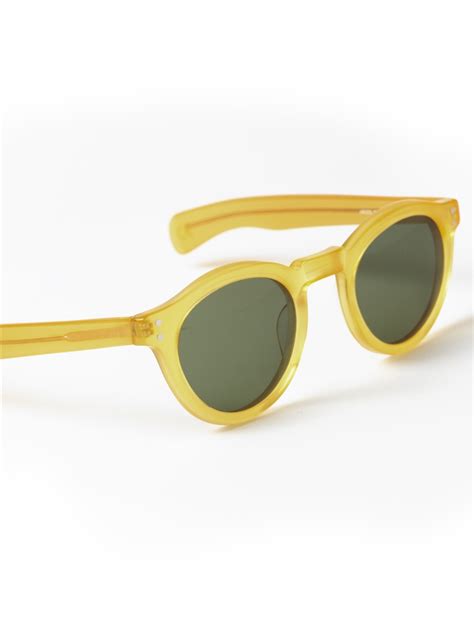bold round sunglasses in translucent yellow the ben silver collection