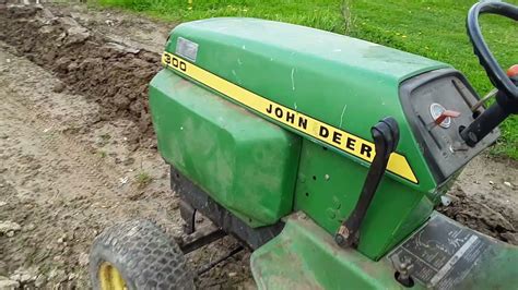 john deere  garden tractor plowing  brinely  bottom plow youtube