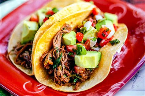 shredded beef tacos with avocado and lime jennifer cooks