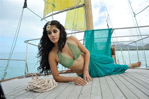 sab hot actress tapasee pannu bikini top sexy stills in saree