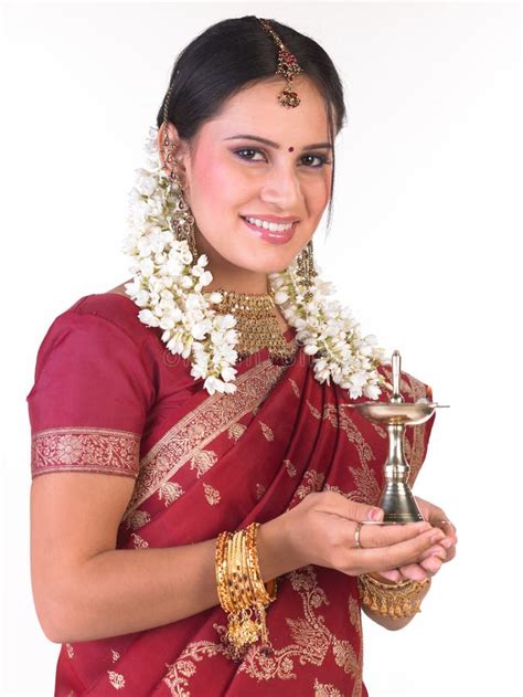 teenage girl sari holding lamp stock   royalty  stock