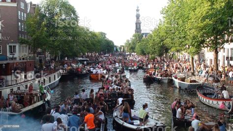 amsterdam pride 2018 canal parade visitors and building