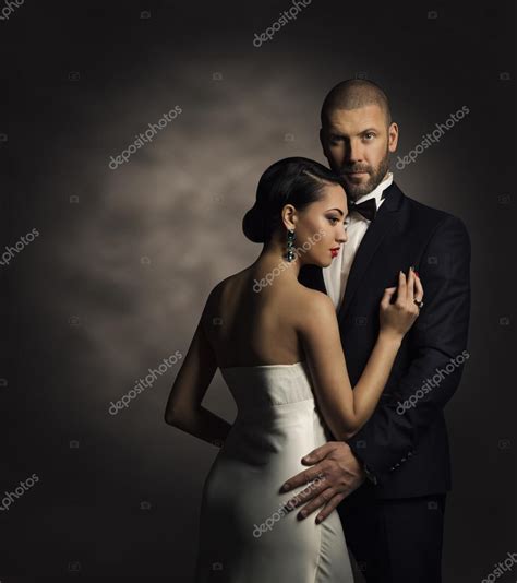 Couple In Black Suit And White Dress Rich Man And Fashion Woman