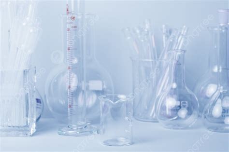 research lab assorted glassware equipment in blue tone photo background