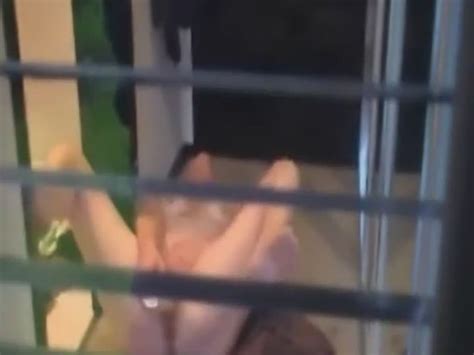 masturbation caught from a window voyeur videos