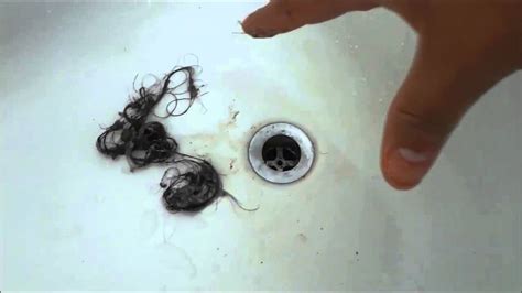 unclogging  bathtub drain removing  hair youtube