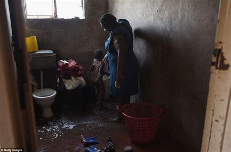 photographer captures the lives of zimbabwe s destitute millions after years of mugabe rule