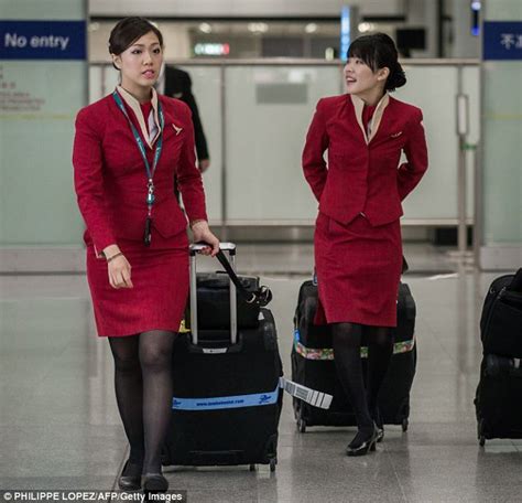 cathay pacific stewardesses complain new uniform is too sexy daily mail online