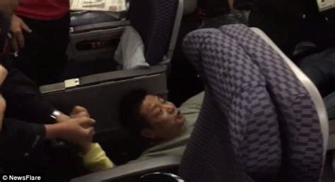 airasia passenger shares pictures of woman who put her feet on her armrest during flight daily