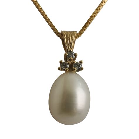perle vedhaeng med brillanter udfort  guld perler guld smykker perler pendant necklace