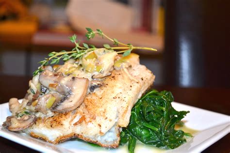 Chilean Sea Bass With Brandy Creamed Leeks And Mushrooms A Hint Of Wine