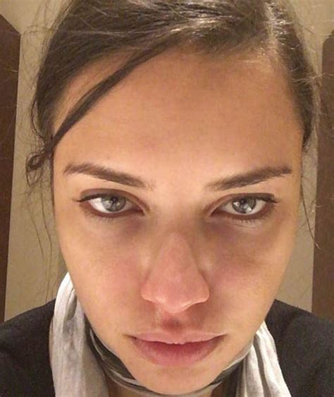 adriana lima posing with no make up in this selfie