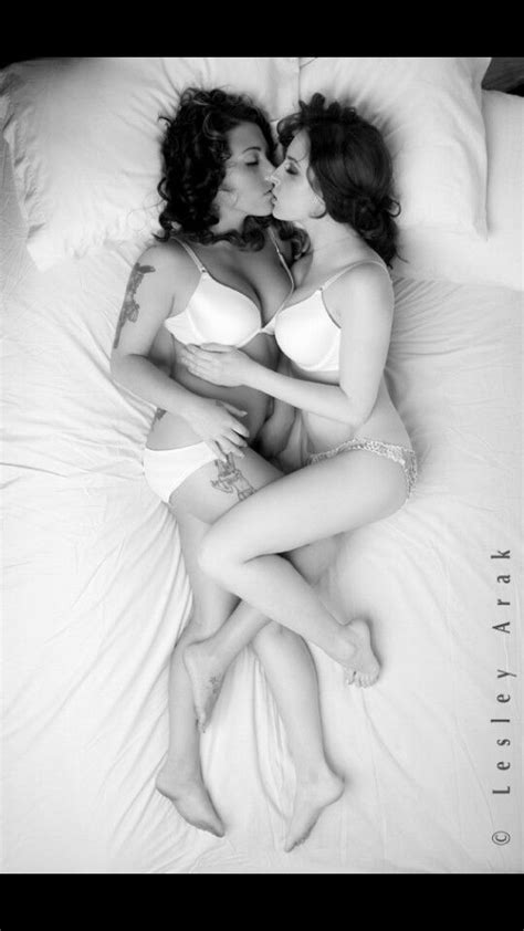 sexy photo of two girls in bed kissing tattoos intimate