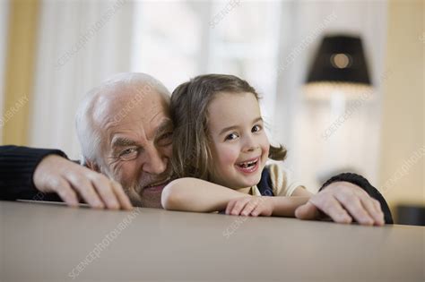 Old Man And Young Girl Smiling Stock Image F003 7603 Science