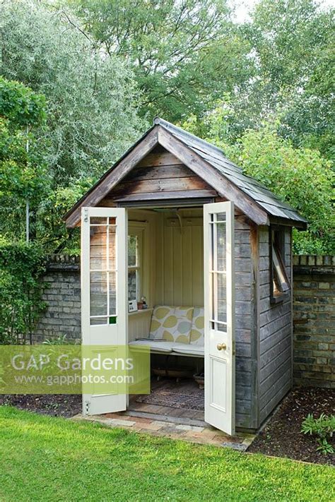 gap gardens small timber summer house  bench seat