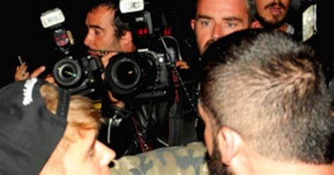 justin bieber punches photographer in paris see the photos e news