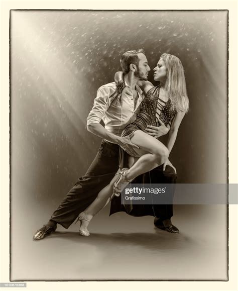 couple dancing tango in buenos aires argentina high res