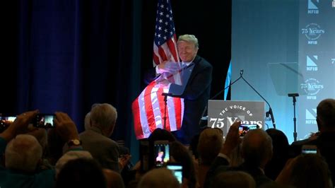 trumps flag hug  viral cnn video