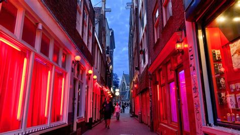 amsterdam s red light district to reopen this week complex uk