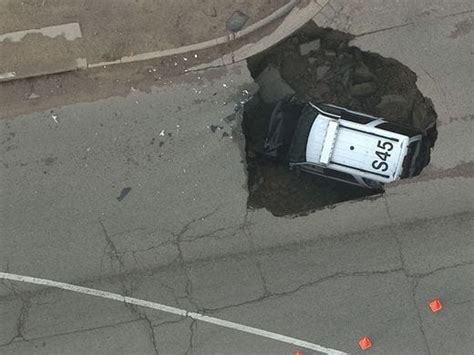 Police Suv Swallowed By Sinkhole In Colorado
