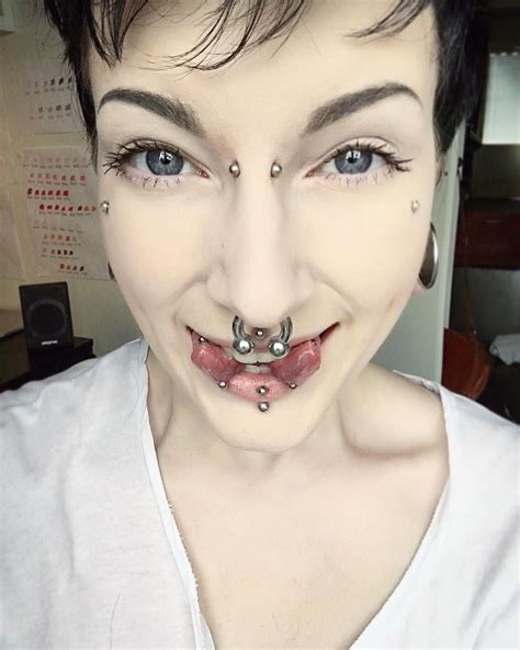 tongue split bridge and vertical labret by ever so talented
