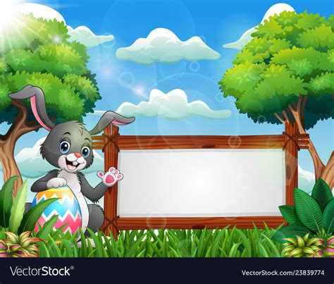 easter bunny holding  large egg   blank sign