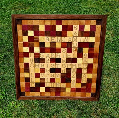 carved multi colored family  board  scrabble tiles etsy