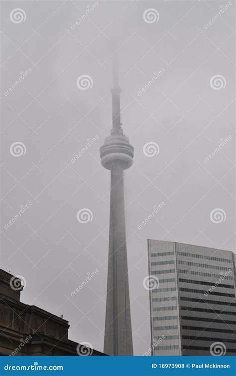 cn tower   heavy fog editorial stock photo image  foggy