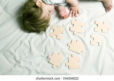 sleeping child laying   jigsaw stock photo  shutterstock