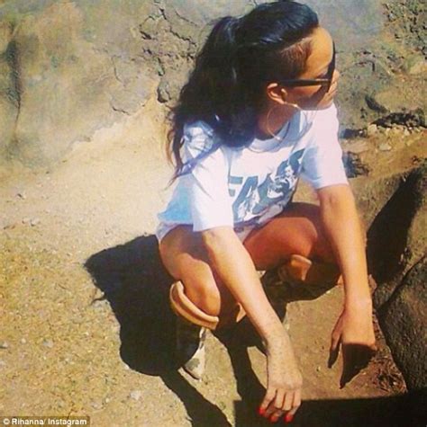 Wild Girl Rihanna Embraces An Elephant As She Continues