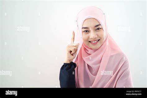 Portrait Of A Beautiful Woman Muslims In Asia Wearing Pink Hijab Are