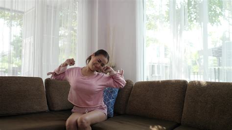 Woman Stretching On The Sofa In The Morning 1802976 Stock Video At Vecteezy