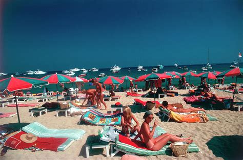 Beach At St Tropez Photograph By Slim Aarons Fine Art America