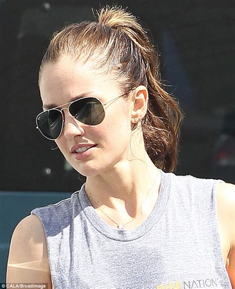 Minka Kelly Sports Heavy Sweat Stains On Her Shirt As She Leaves The