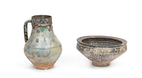 bonhams a kashan monochrome pottery jug and sultanabad pottery bowl