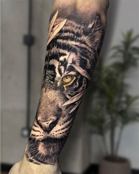 Realistic Tiger Portrait Tattoo Located On The Forearm