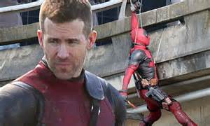 ryan reynolds shows off his handsome face while filming