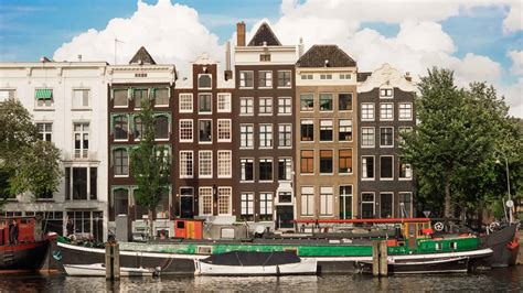 airbnbs  amsterdam centre canal houses houseboats world   whim