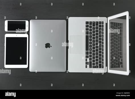 kyiv ukraine october   apple macbook air silver macbook pro space gray ipad mini