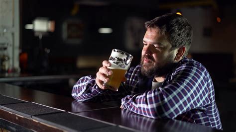 bearded man drinking beer enjoying drink  stock footage sbv
