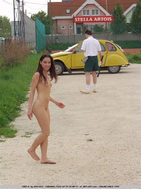 nasty exhibitionist orsetta loi walks in the streets naked with men staring at her