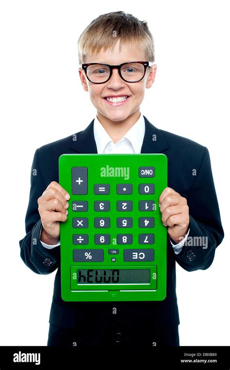 school boy holding calculator upside  stock photo alamy