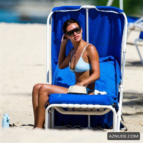 montana brown wearing her skimpy blue bikini joined with