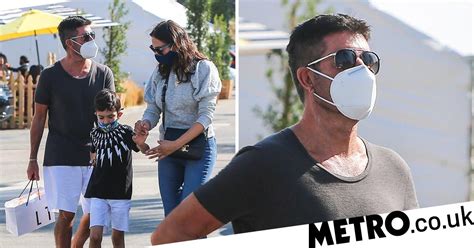 simon cowell spotted walking for first time since horror