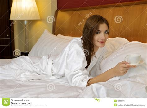 sexy brunette with make up in dressing gown stock image cartoondealer