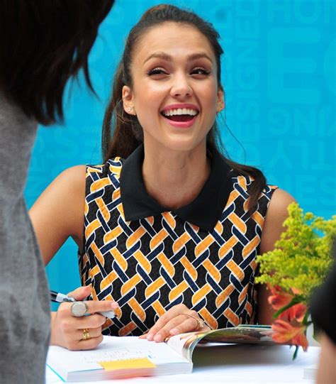jessica alba is mobbed by fans as she autographs copies of her eco