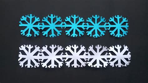 How To Make Easy Paper Snowflakes Paper Chain Snowflakes Christmas