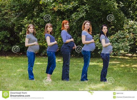 Five Pregnant Women In The Same Clothes Outdoor Stock